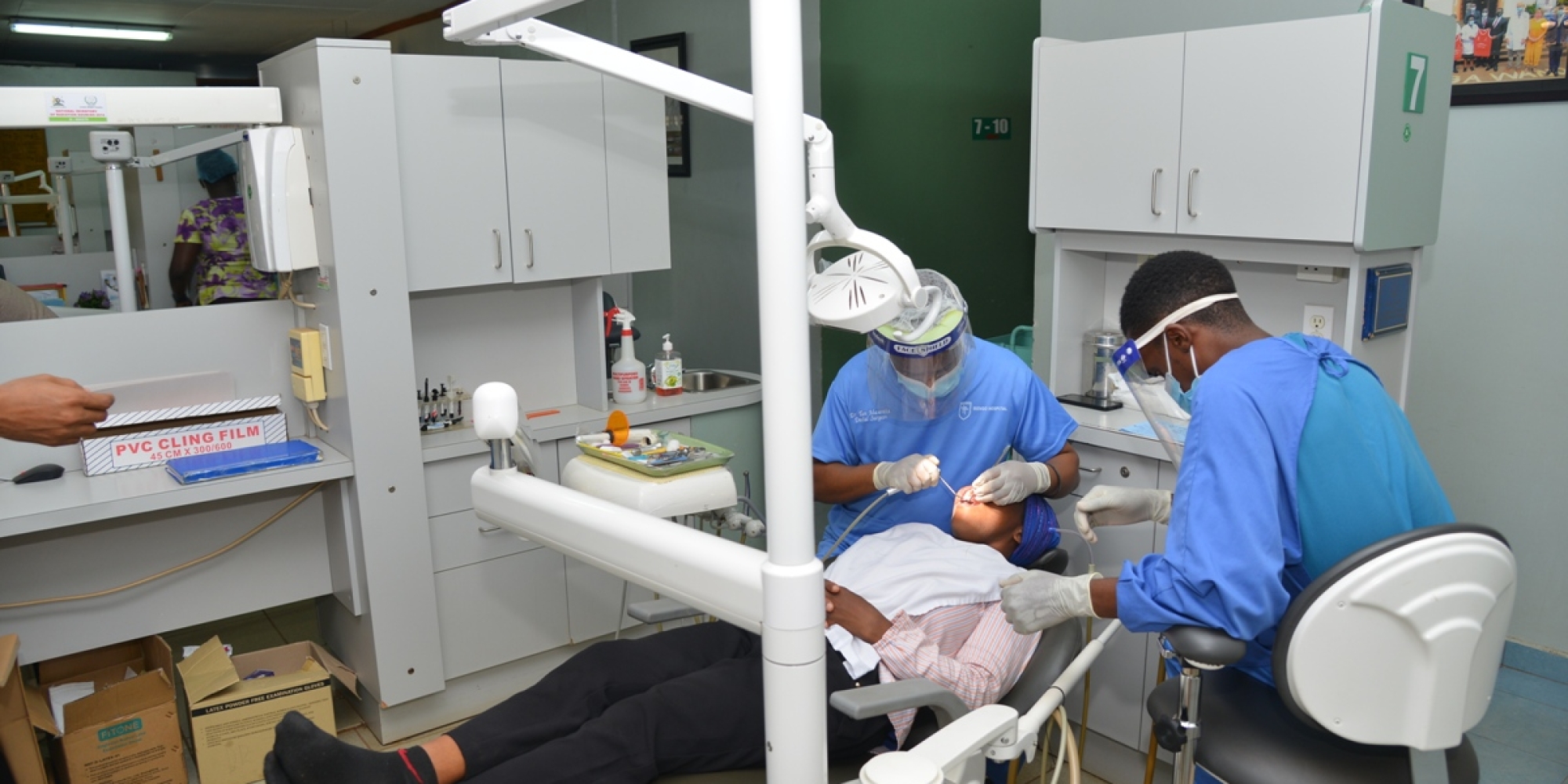 A patient receiving services in the new modern Dental Clinic